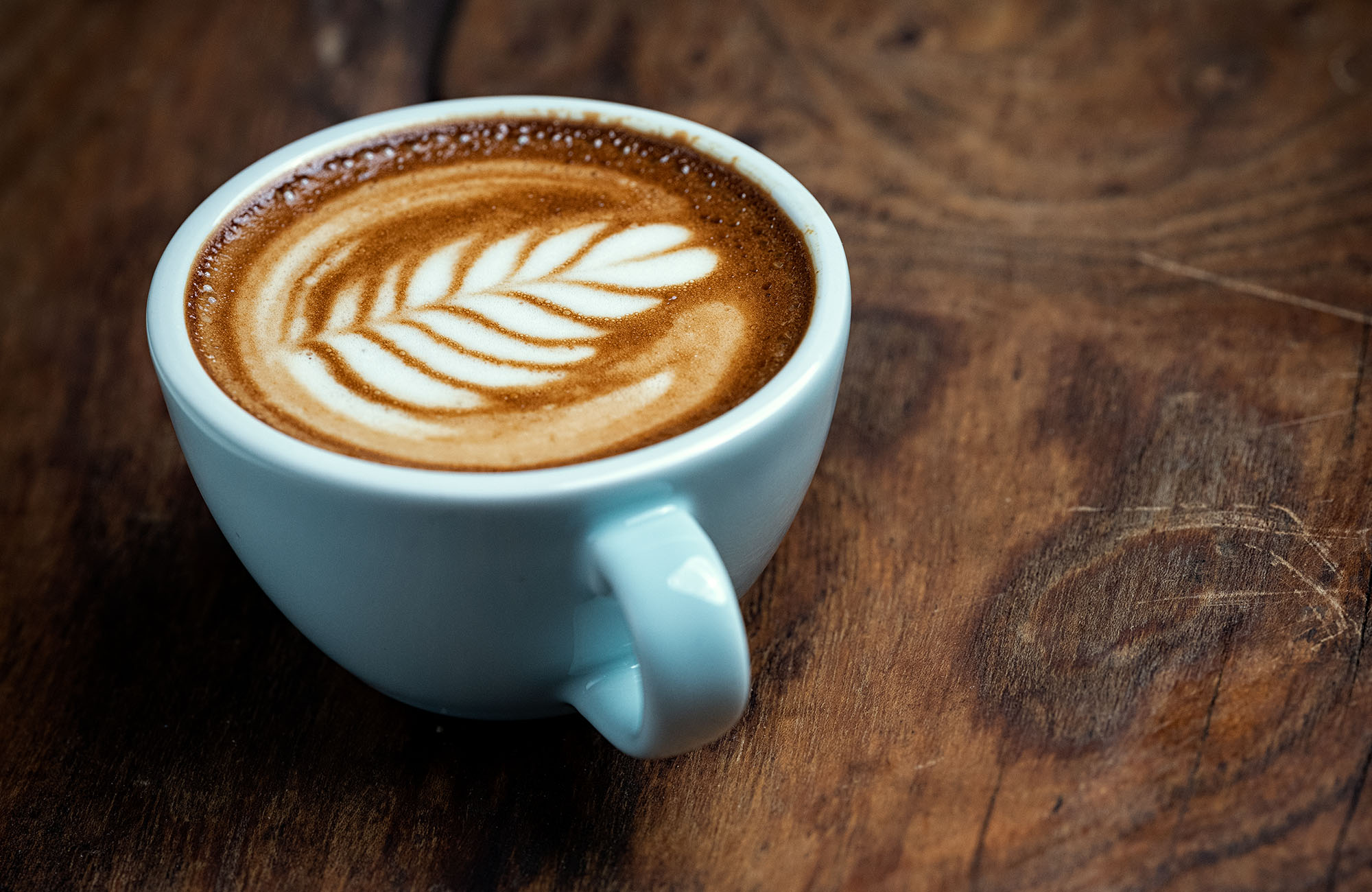 Vad är skillnaden mellan en caffe latte och en cappuccino?